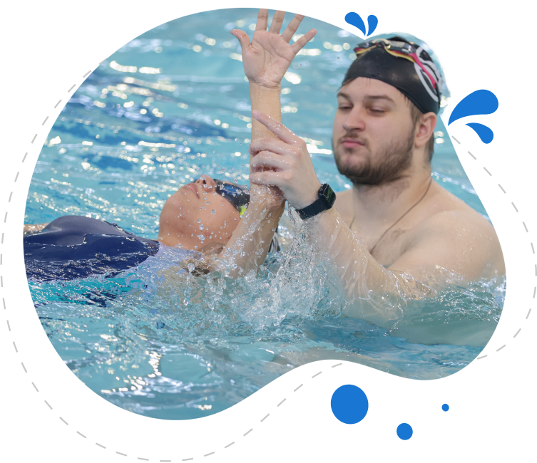 Splash Fit coach with a young swimmer