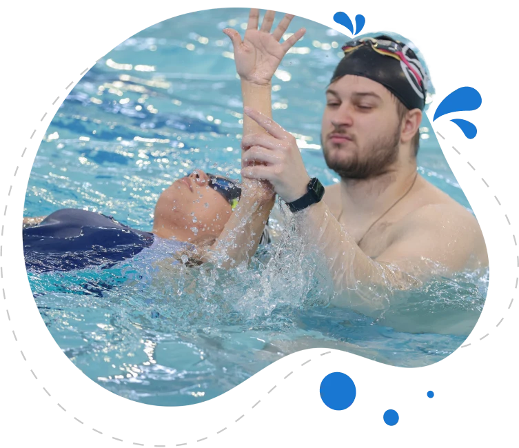 Splash Fit coach with a young swimmer